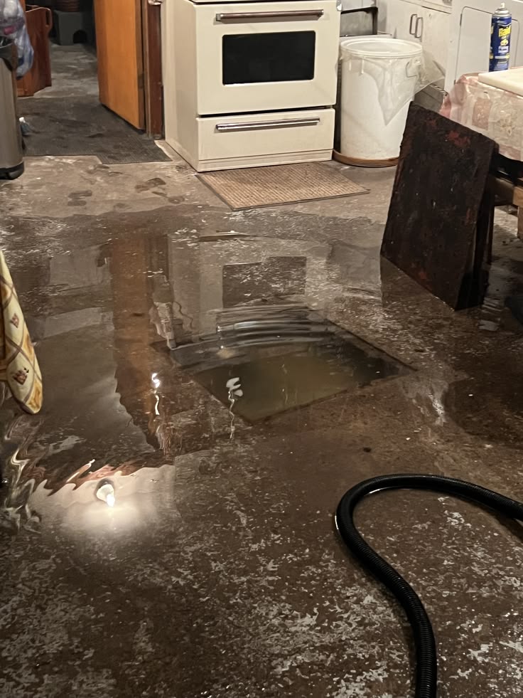 Restoration technician reviewing insurance paperwork with a Katy homeowner